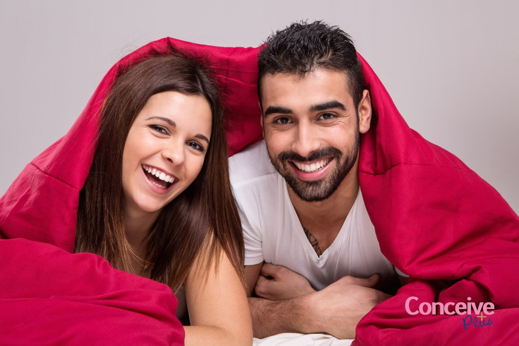 Couple under a blanket